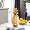 14" Decorative Polystone Pineapple Figurine Gold - Olivia & May -Home Decor Shop GUEST 255ed335 47a3 4088 8769 195cf472b299