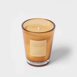 Colored Vase Glass With Dustcover Tobacco And Bergamot Candle Yellow - Threshold™ -Home Decor Shop GUEST f2d322ed 7929 4fe4 80ce 3b86e1456d1f